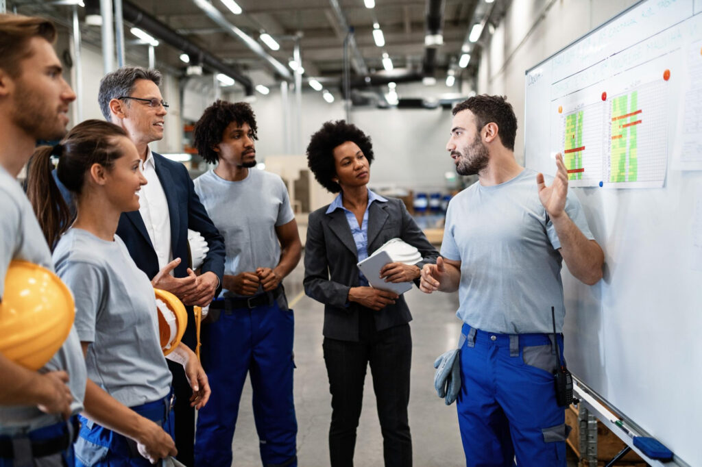 A team looks at numbers for a multi-location facility management.